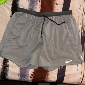 Nike Run Dri - Fit 5’ shorts with Pelaton branding